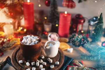 hot tasty cocoa cup with marshmallow on wooden table at christmas holiday