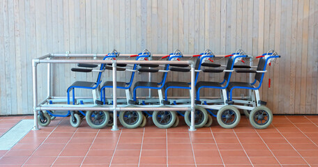 Row of wheel chairs, chained