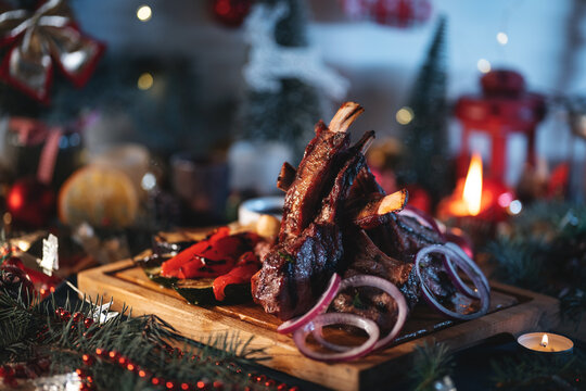 grilled barbecue meat ribs, veal, beef, lamb rack with vegetables, christmas bbq