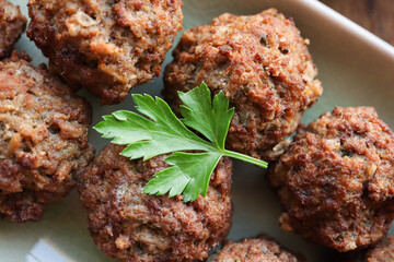 Mini beef frikkadels. Traditional South African meatballs made with mince, bread, spices, eggs and onion 