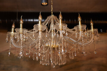 Close-up of a beautiful crystal chandelier Beautiful chandelier. luxury expensive chandelier...
