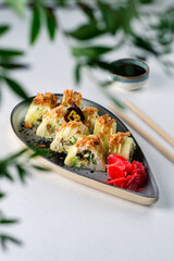 Sushi roll mix with smoked eel, avocado and cheese. Sushi menu. Japanese food.