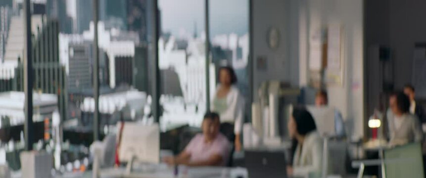 PACKSHOT DEFOCUESED BACKGROUND - People working in the busy office in a skyscraper