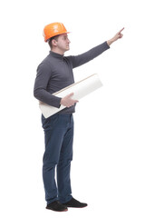 in full growth. confident male architect with drawings.