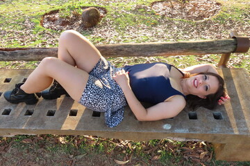 person relaxing on a bench