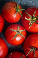 Photo of very fresh tomatoes. Tomatoes close-up, macro photography.