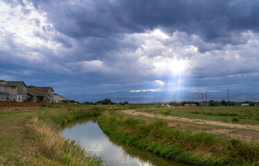 Fototapeta na wymiar Sun rays through the clouds in Colorado, USA