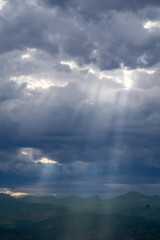Sun rays through the clouds in Colorado, USA
