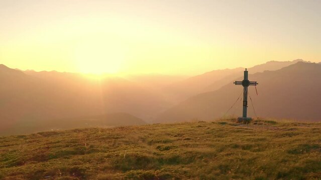 Summit cross in the morning sunshine