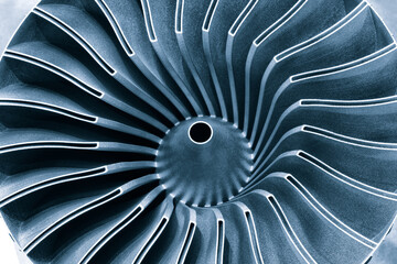 Steel blades of turbine propeller 3D printing. Close-up view. Selected focus on foreground,...