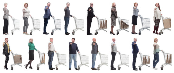 Obraz premium a group of people with a shopping cart point their finger at the camera