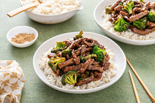 Beef and broccoli stir fry served over rice