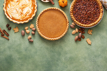 Traditional fall Thanksgiving pies, pumpkin and pecan pie