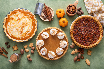 Traditional fall Thanksgiving pies, pumpkin and pecan pie - obrazy, fototapety, plakaty