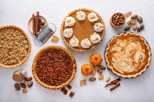 Traditional fall Thanksgiving pies, pumpkin and pecan pie