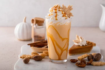 Zelfklevend Fotobehang Pumpkin pie milkshake with caramel syrup and whipped cream © fahrwasser