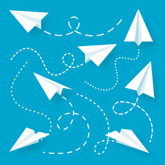 Various realistic white paper planes collection. Handmade origami aircraft with dotted doodle route line. Business concept element, project startup and goal achievement. Vector illustration