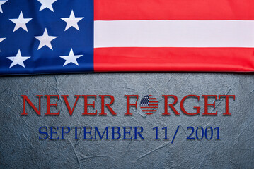 USA flag on grey background, top view. National Day of Prayer and Remembrance for the Victims of...