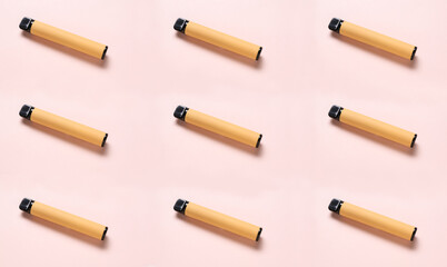 Many electronic cigarettes on light background. Pattern for design