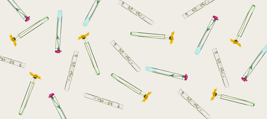 Test tubes with flowers on light background. Pattern for design