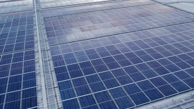 solar panels on a roof , green clean energy concept.	