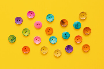 Colorful button on yellow background