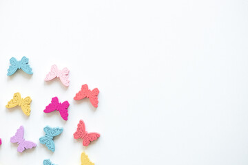 Colored figures in the form of butterfly on a white background