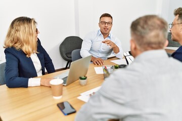 Fototapeta premium Group of middle age business workers working at the office.