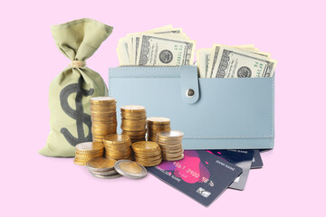 Wallet with dollars, coins, money bag and credit cards on color background