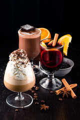 set of hot alcoholic cocktails Irish coffee, mulled wine and chocolate cocktail