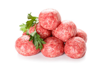 Raw meat balls with parsley on white background