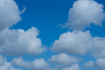 Naklejka na ściany i meble blue sky with clouds background, summer time, beautiful sky