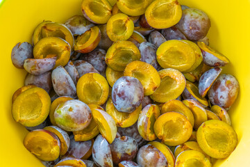 Plum halves background. Juicy pulp of plums texture. Farm organic bio fruits.Plums harvest.Plum jam preparation.plum abundance 