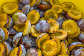 Plum halves . Juicy pulp of plums texture. Farm organic bio fruits.Plums harvest.Plum jam preparation.plum abundance 