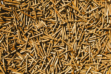 rusty nail display steel nails pile studio construction backdrop sales working building materials workshop background