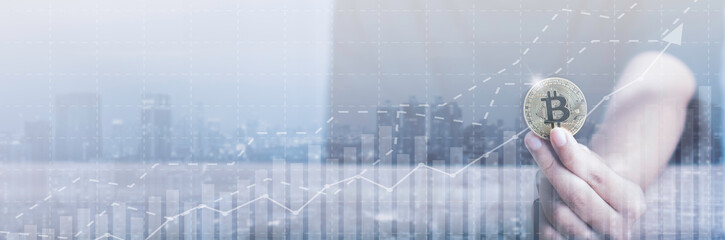 Double exposure city of hand hold bitcoin for background. Financial investment and success market...