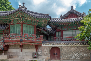 Colorful Korean painted wood building architecture at the Changdeokgung palace in Seoul South Korea	