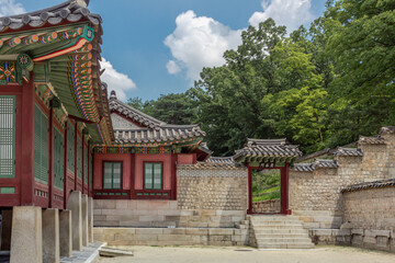 Colorful Korean painted wood building complex architecture at the Changdeokgung palace in Seoul South Korea	