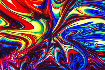 Vibrant Abstract Fluid Swirls in Red, Yellow, and Blue Colors