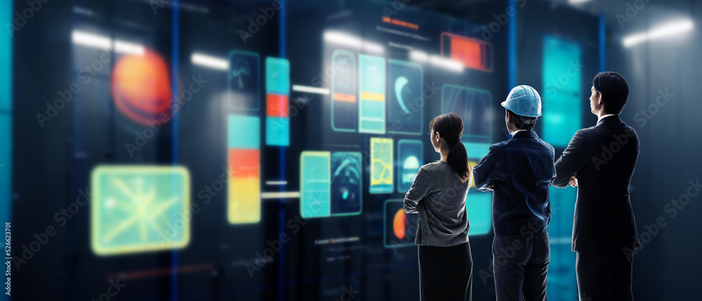 Aufkleber engineer group looking at data screen. wide image for banners, advertisements.
