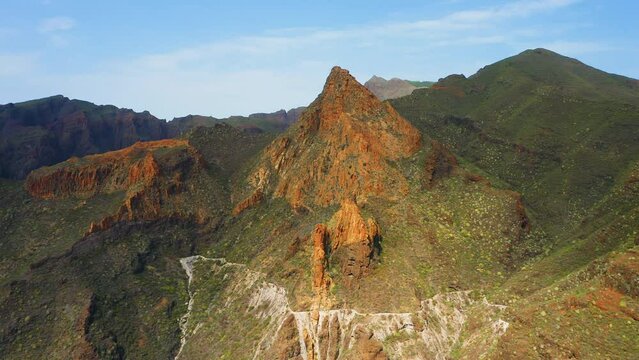 Paradise mountains for hikers. Beautiful trek to gorge, Risco Blanco. Buenavista del Norte. Great place for leisure activity. Wide aerial view of clay rock. National Teno Park. Spring vegetation.