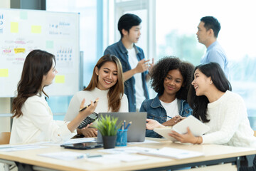 Group of businesspeople having meeting in conference room.