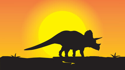 dinosaur silhouette at sunset