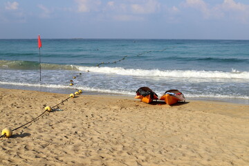 Sports equipment and equipment in a city park on the seashore.