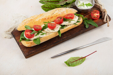 Baguette with tomato and mozzarella.