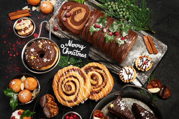 Traditional Christmas dessert on dark background.