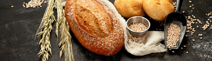 Bread assortment on dark background.