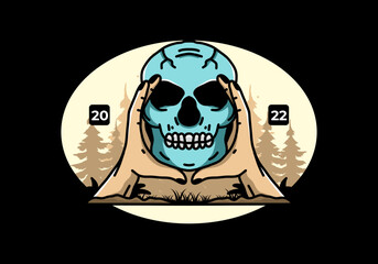 Two hand holding a skull illustration badge
