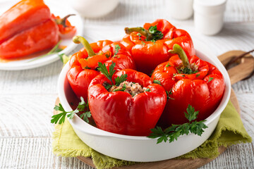 Red bell peppers stuffed with minced meat and rice and cooked in a tomato sauce.