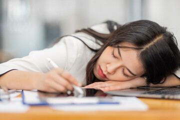 business, people, Asian women paperwork and deadline concept - stressed businessman with papers and charts sitting at table in workplace office